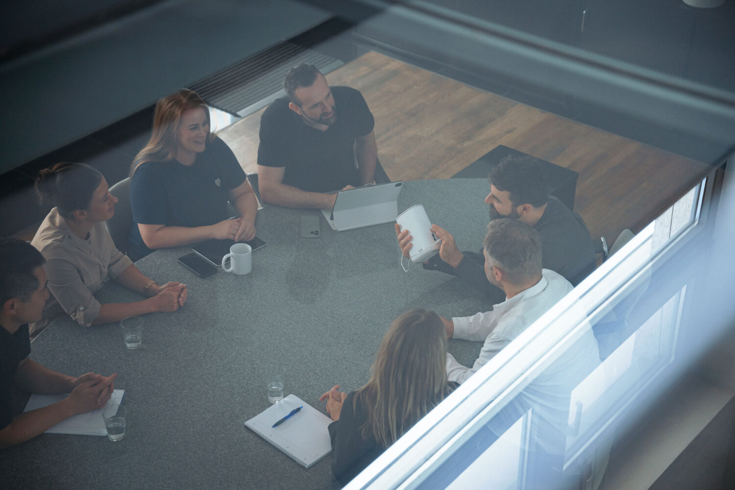 Team-Meeting von imulani Experten für Telekommunikationslösungen
